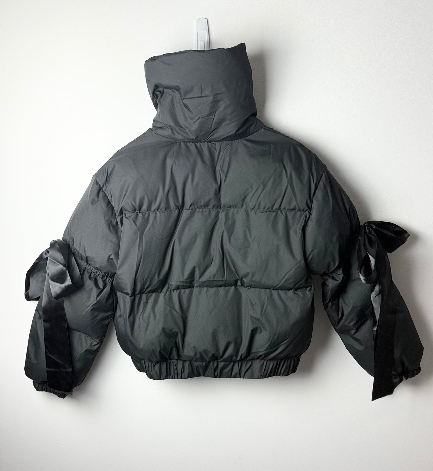 Midnight Ribbon Puffer Jacket – Feminine, Warm & Boldly Styled