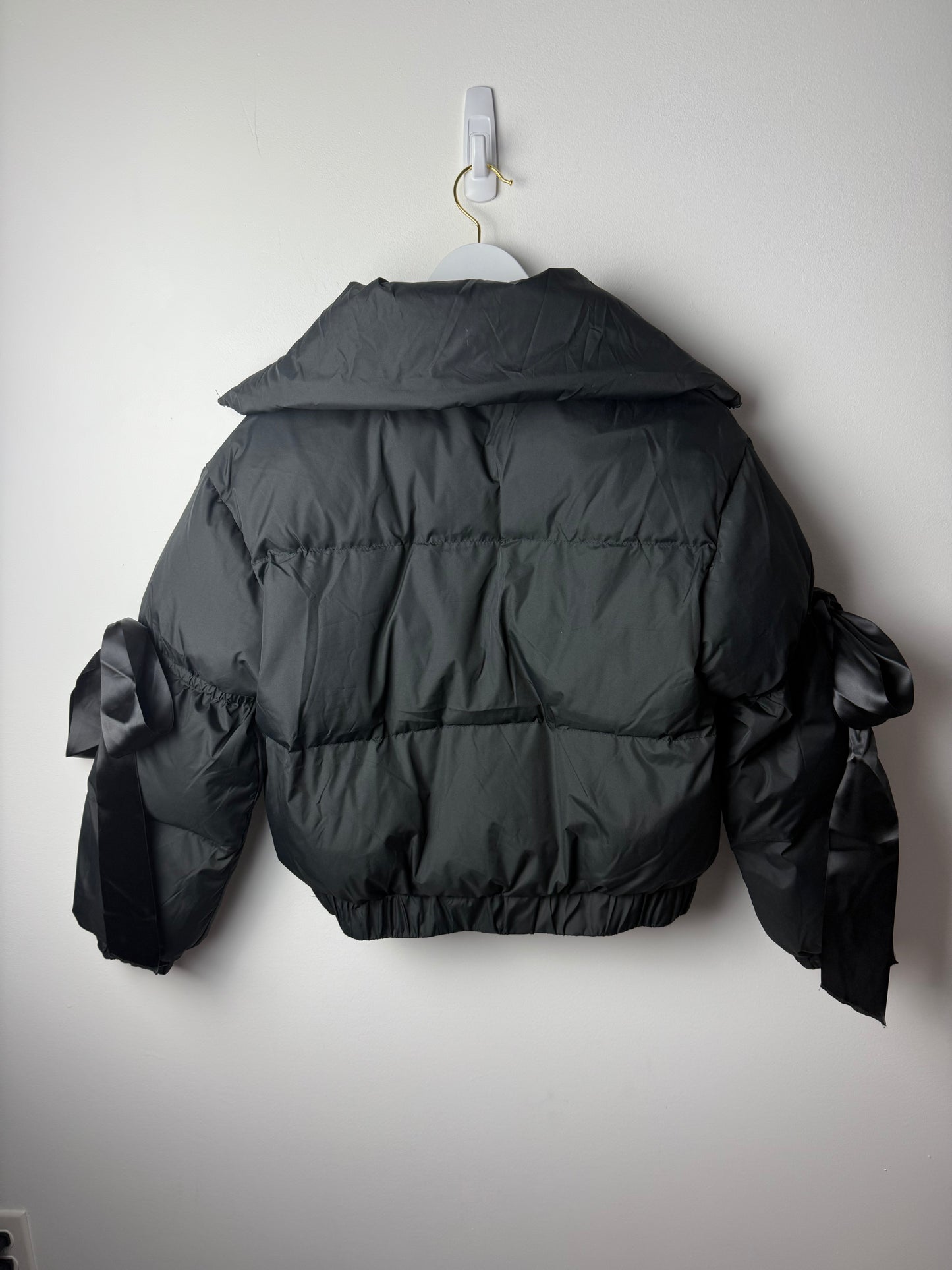 Midnight Ribbon Puffer Jacket – Feminine, Warm & Boldly Styled