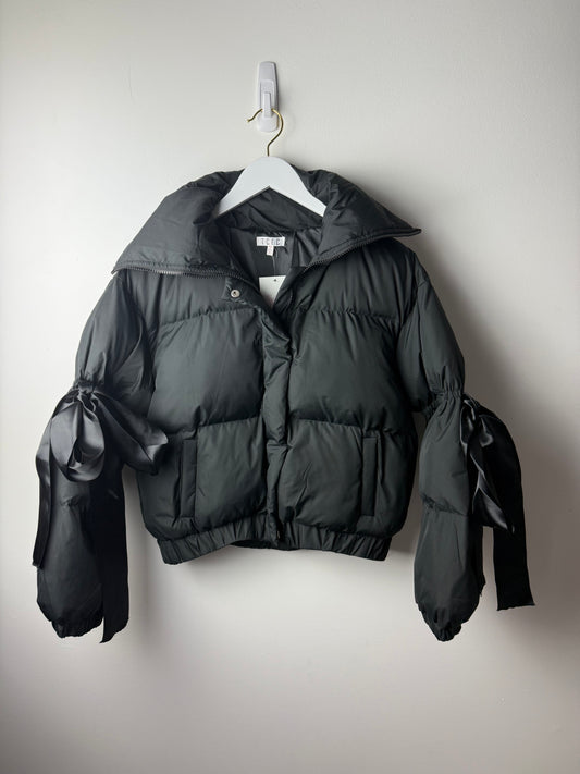 Midnight Ribbon Puffer Jacket – Feminine, Warm & Boldly Styled
