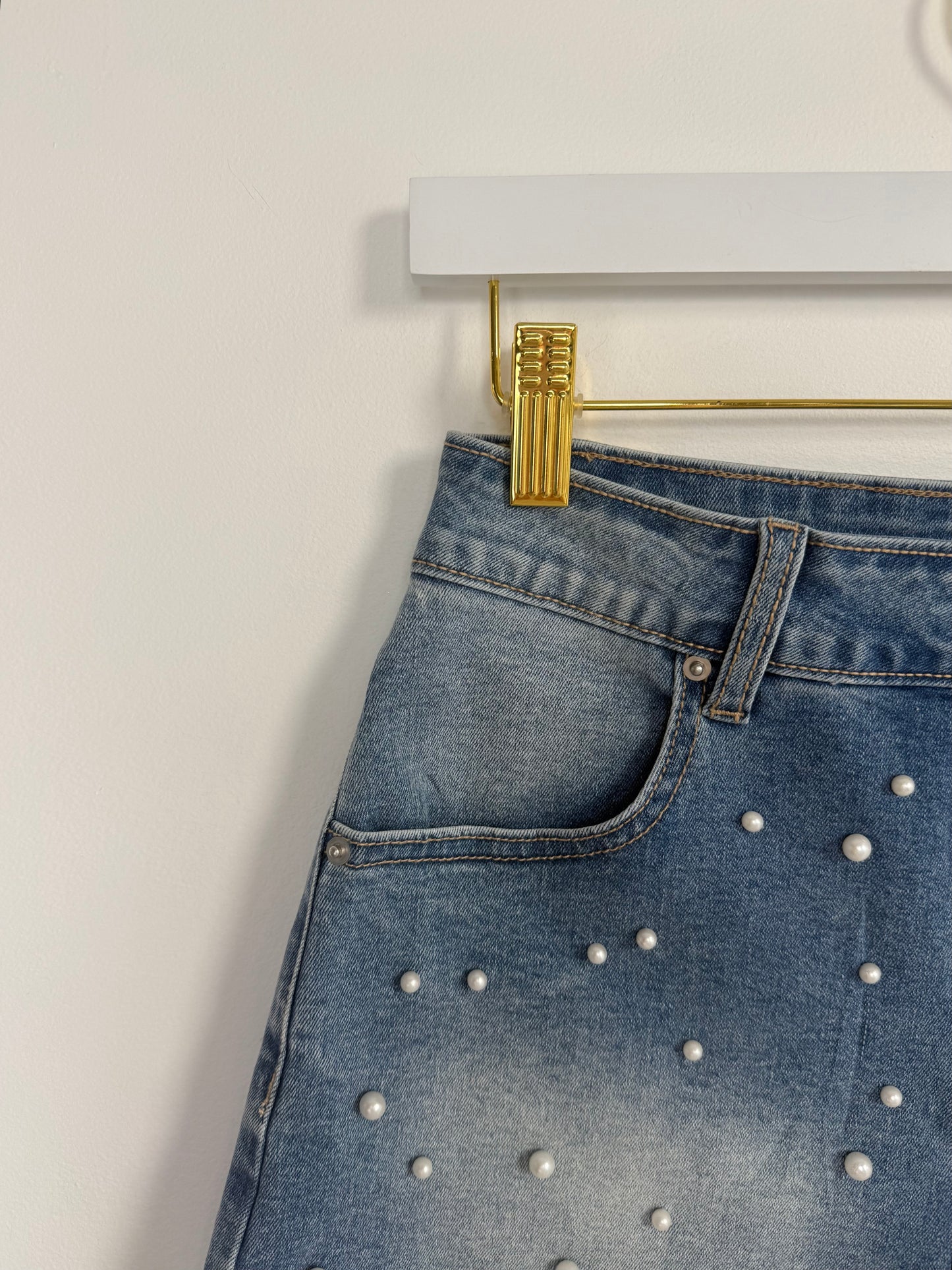High-rise pearled denim shorts