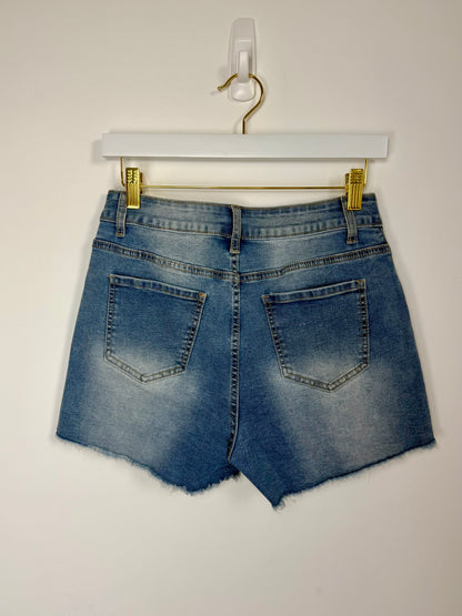 High-rise pearled denim shorts