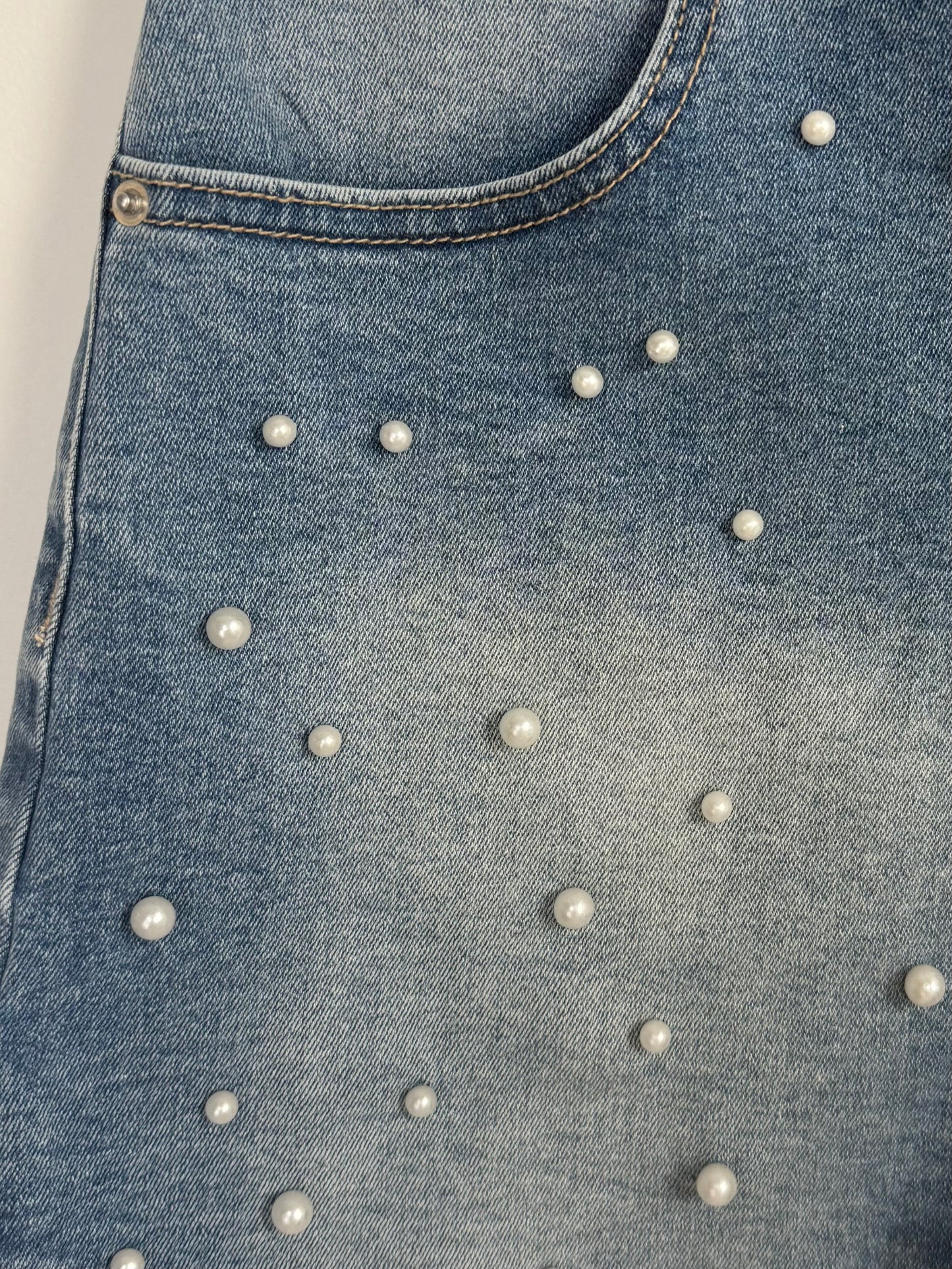 High-rise pearled denim shorts