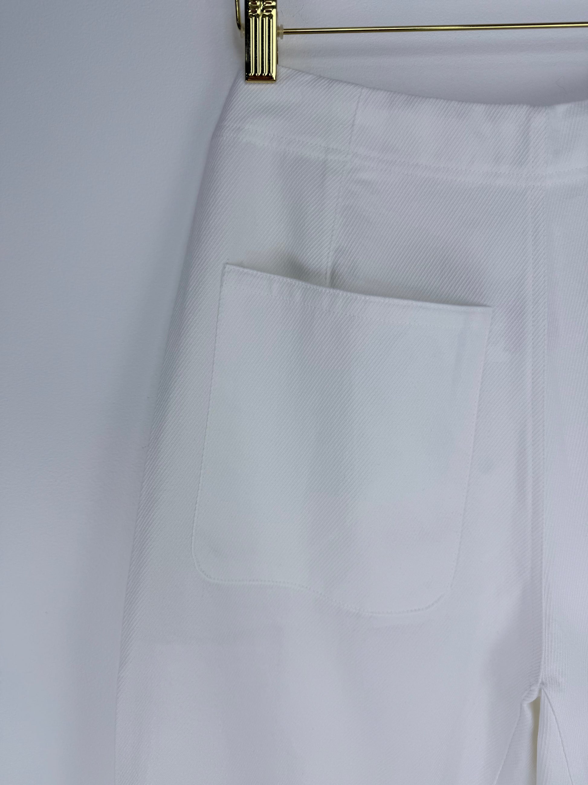 White pants with a pocket on a white background