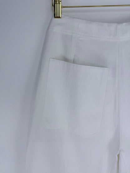 White pants with a pocket on a white background