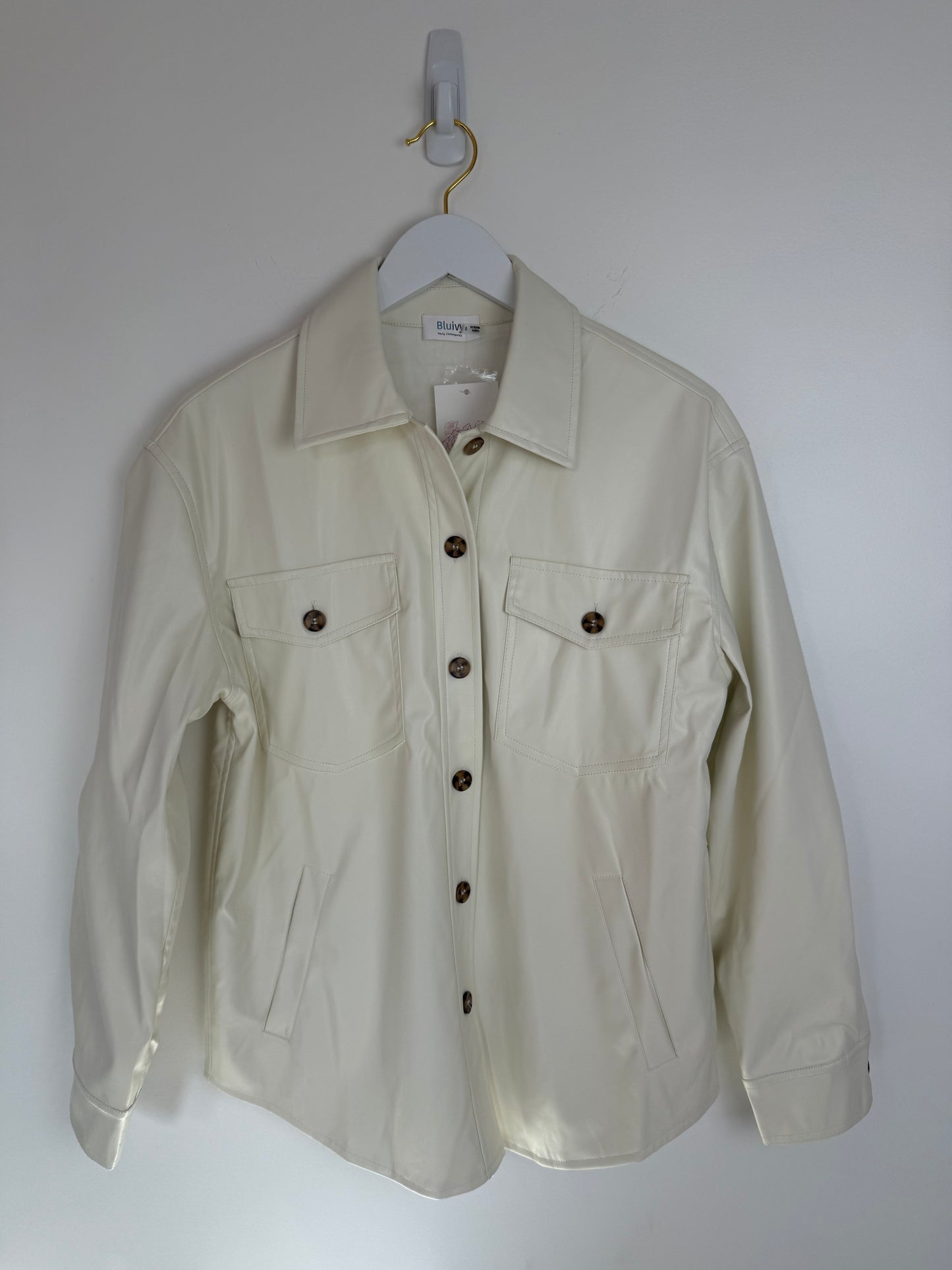Beige jacket on a white background