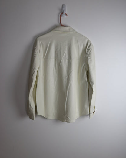 ivory vegan leather shacket hanging