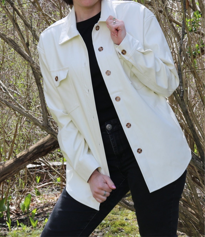 ivory vegan leather shacket on model 