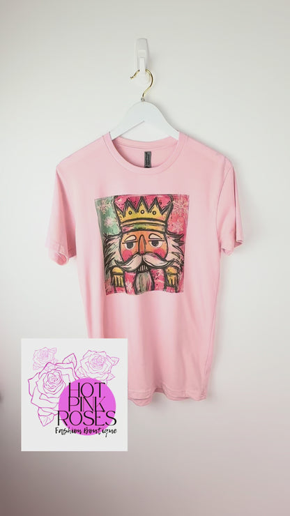 Nutcracker Pop — Soft Pink Colorful Christmas Graphic Tee